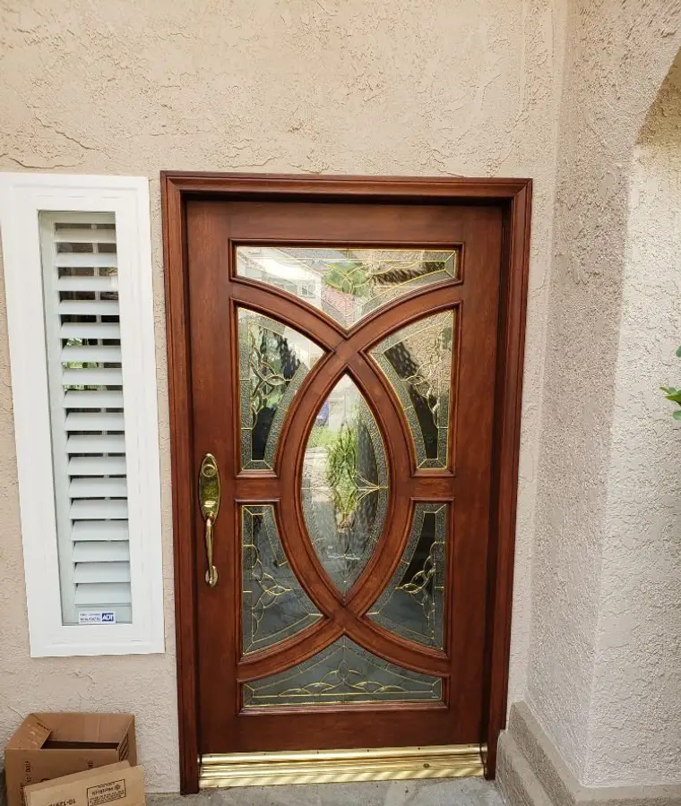 Refinished mahogany front door with leaded glass
